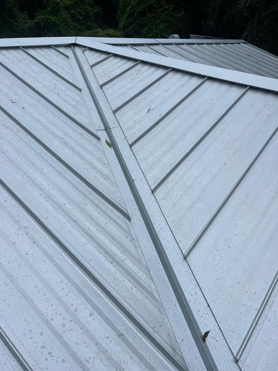 Valley flashing and ridge caps where two roof sections meet on the Hampton roof
