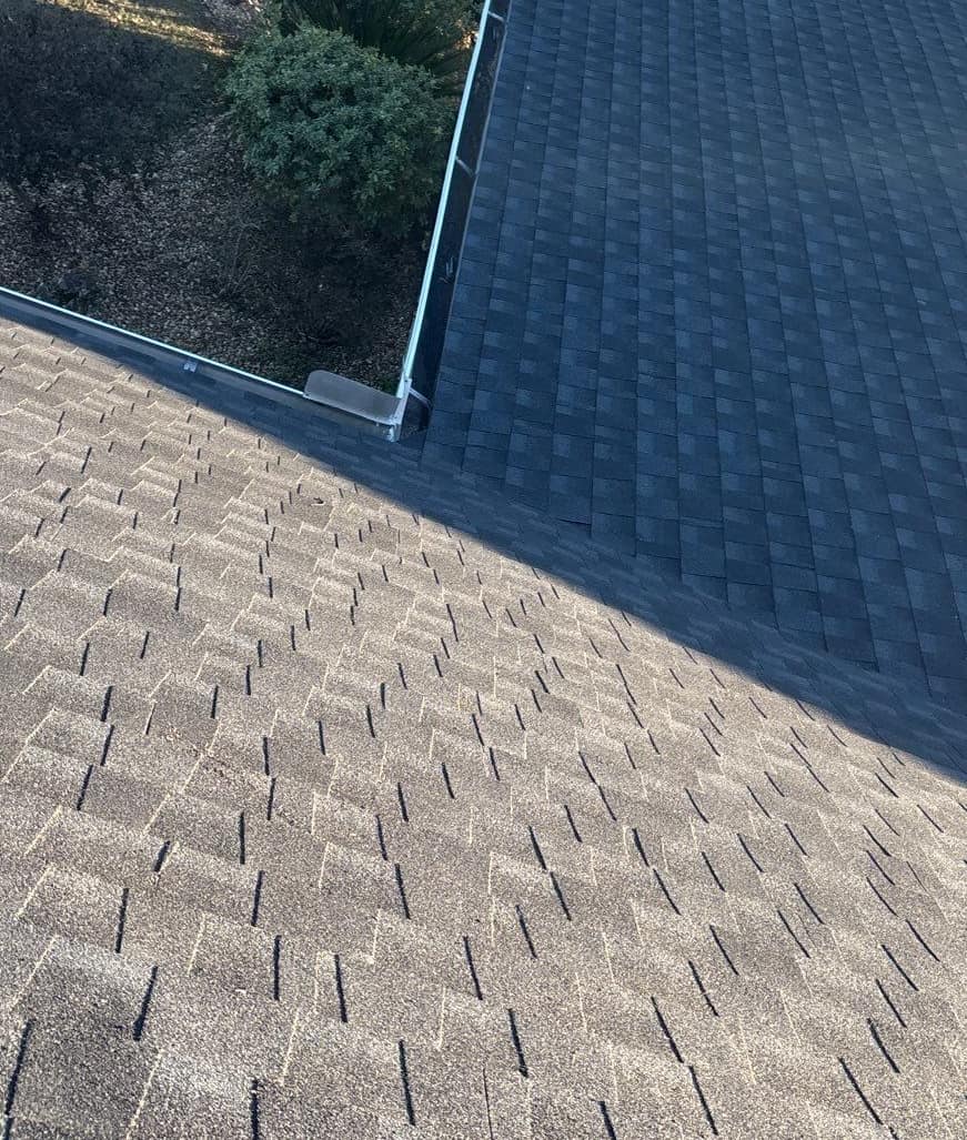 Valley where two slopes of the new High Springs roof meet above a gutter corner